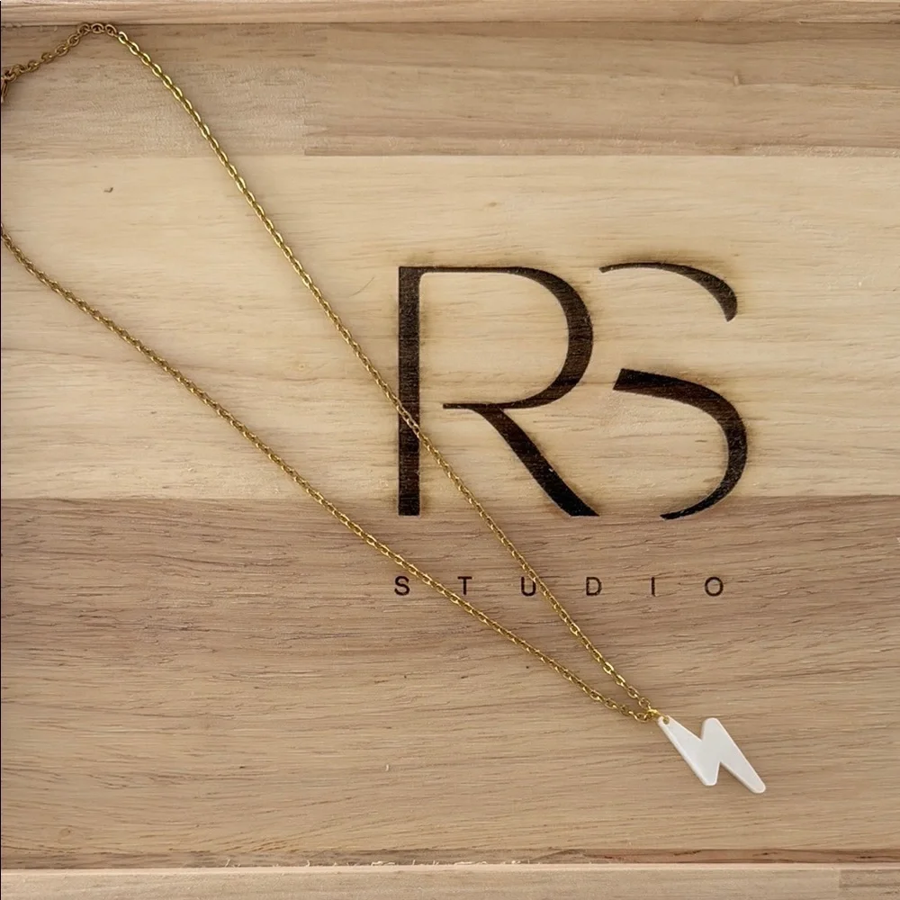 Gold Necklace with White Crescent Pendant